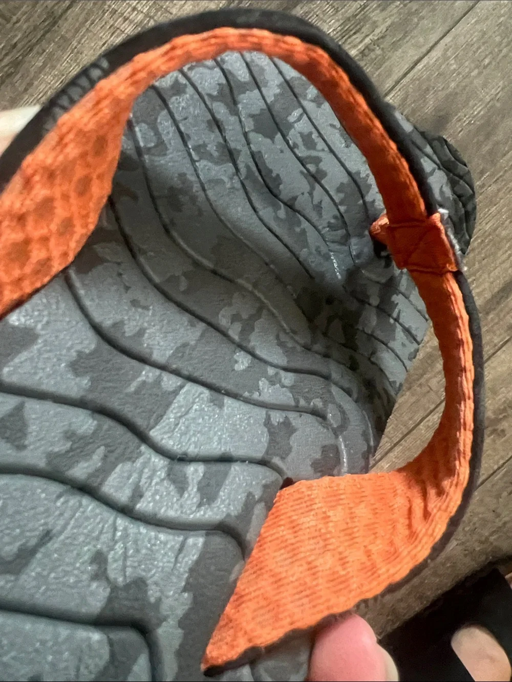 Reef Roundhouse Flip Flops in orange and black